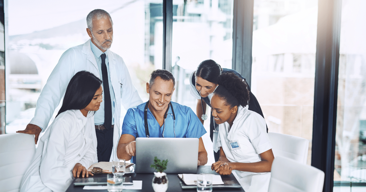 Medical professionals collaborating on business strategies, exploring unsecured credit lines for practice growth.